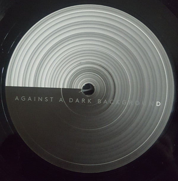 Against A Dark Background | Retro Vinyl Club