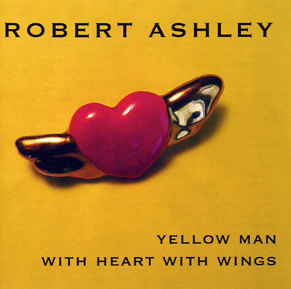 Yellow Man With Heart With Wings | Retro Vinyl Club