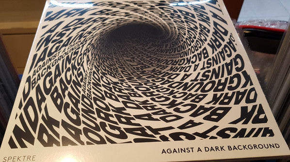 Against A Dark Background |   Retro Vinyl Club